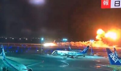 Avion în flăcări pe pista aeroportului Haneda din Tokyo