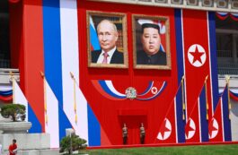 Portretele lui Vladimir Putin și Kim Jong-Un